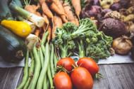 Fresh green vegetables should be included in a high-fiber diet. (Image via Unsplash/Markus Spiske)